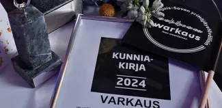Pohjois-Savon yrittäjäystävällisin kunta 2024 kunniakirja ja palkinnot.