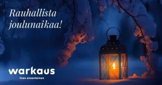 Joulukortti, jossa lyhty ja talvinen maisema.